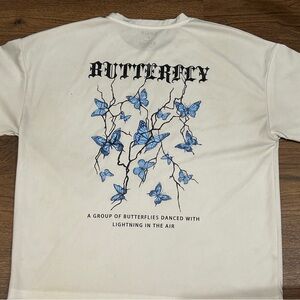 SHEIN White Shirt with Blue Butterfly Design
